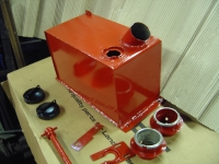  all welded up, primed, and some red paint for a change... also the fuel fillers (petrol and lpg) and some capstan winch fittings getting painted up at the same time